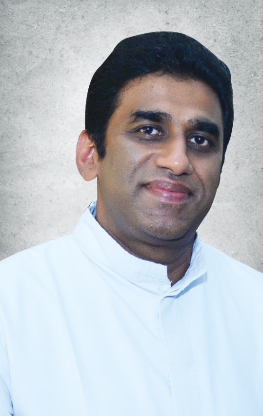Rev. Fr. Jomon Kolencherry CMI (Chancellor)